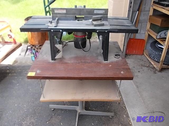 lot 1 image: Craftsman 1-12 HP Router & Table Mounted...
