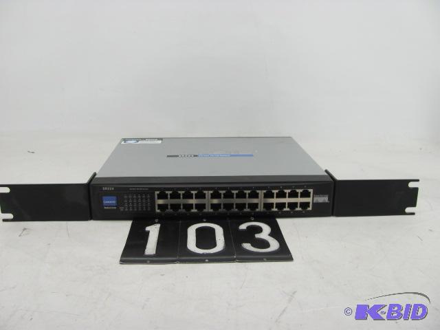 lot 103 image: LINKSYS SR224 24 port network switch. Power c...