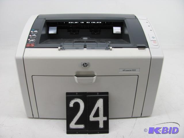 lot 24 image: HP laserjet 1022 printer. This unit has print...