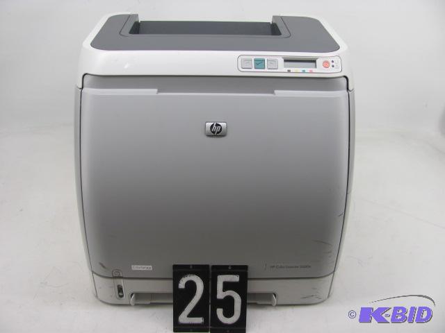 lot 25 image: HP color laserjet 2600n printer. This unit ha...