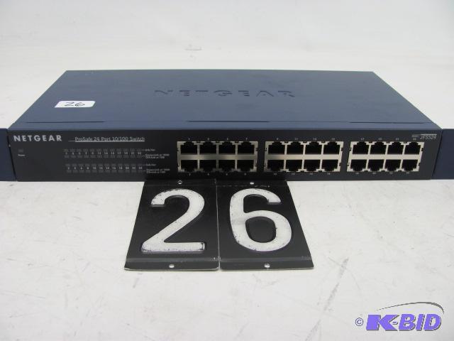 lot 26 image: Netgear LFS524 24 port network switch. This u...
