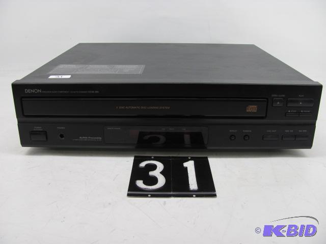 lot 31 image: Denon DCM-360 5 disk CD changer. This unit is...