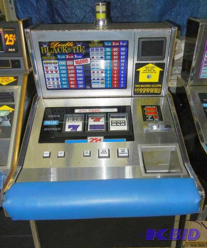 lot 1009 image: 1993 IGT S DOUBLE BLACK TIE REEL SLOT MACHINE