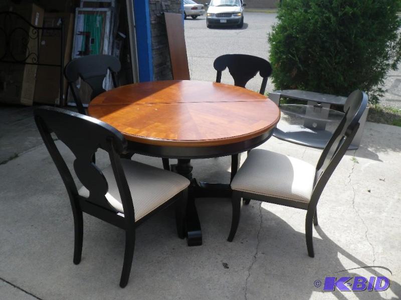 Dining Room Table, 4 matching chairs, one lea...