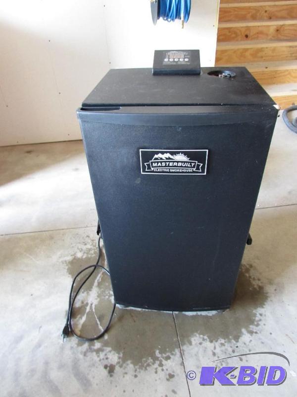 Master built electric smoker with extra shelving and 3 12 bags of wood chips