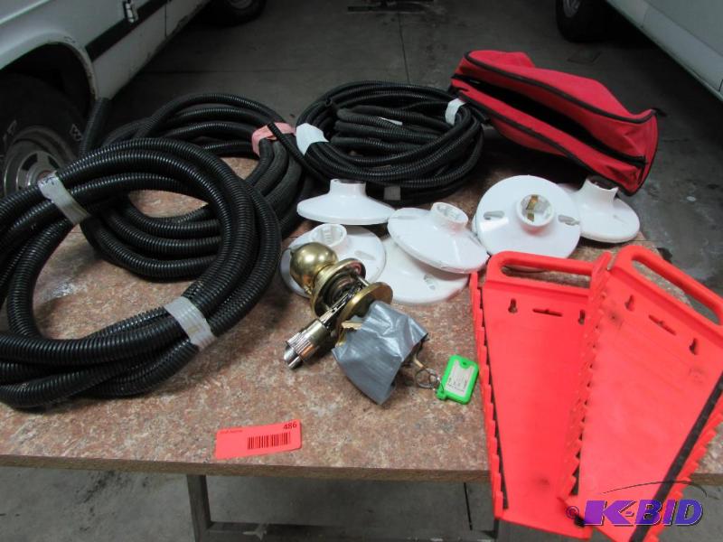 wire covering, door knob with key, 2 wrench holders, 1 bag