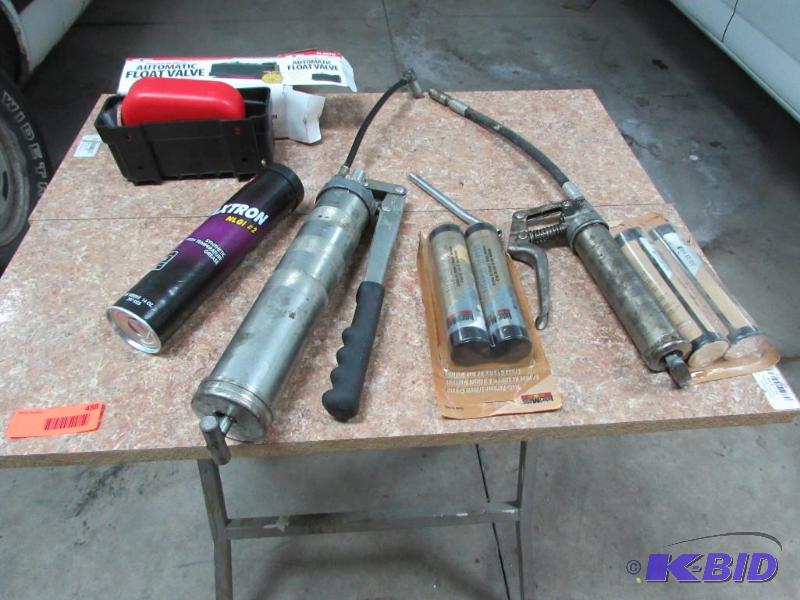 2 grease guns, tube of grease, float shut off