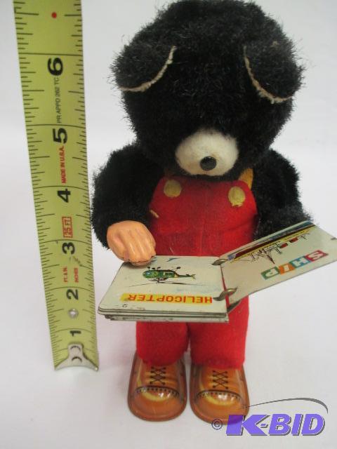 Vintage wind up reading bear