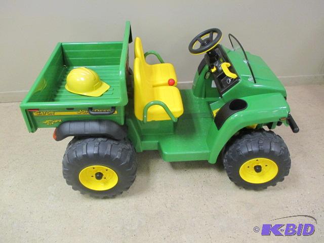 John Deer motorized kids riding Gator with  dump box