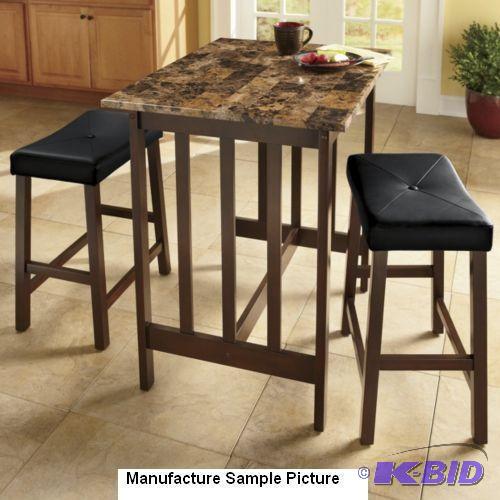 lot 67 image: Three Piece Marble Counterheight Bistro Set -...