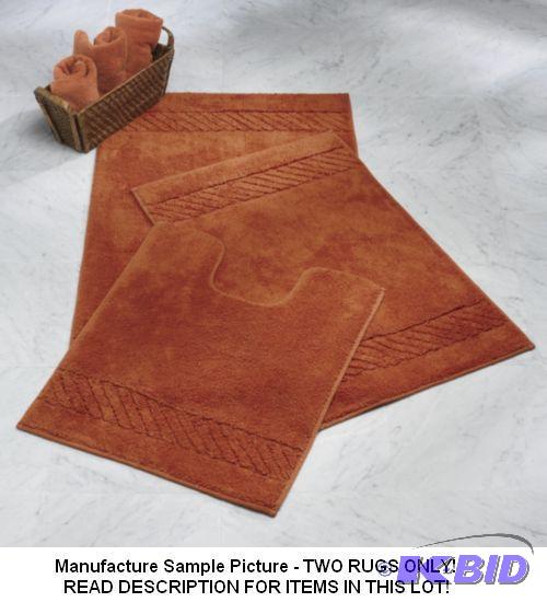 lot 97 image: Two Piece Rug Set - Orange -&nbspCozy set in...