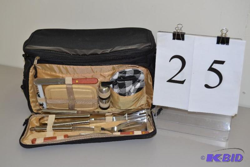 lot 25 image: New cooler with utensiles