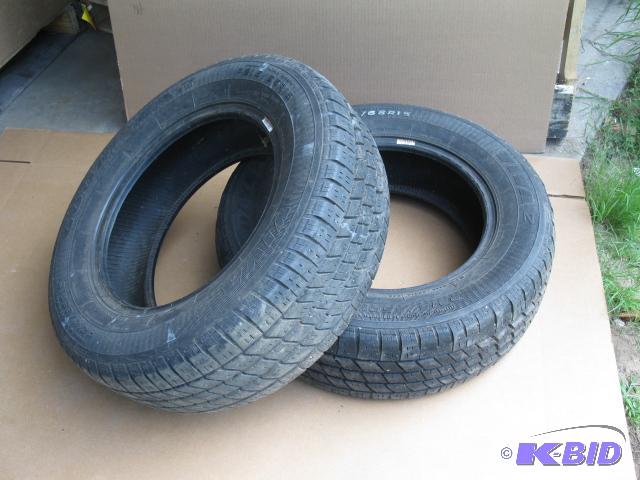 2 tires, P21565R15, half tread or better...