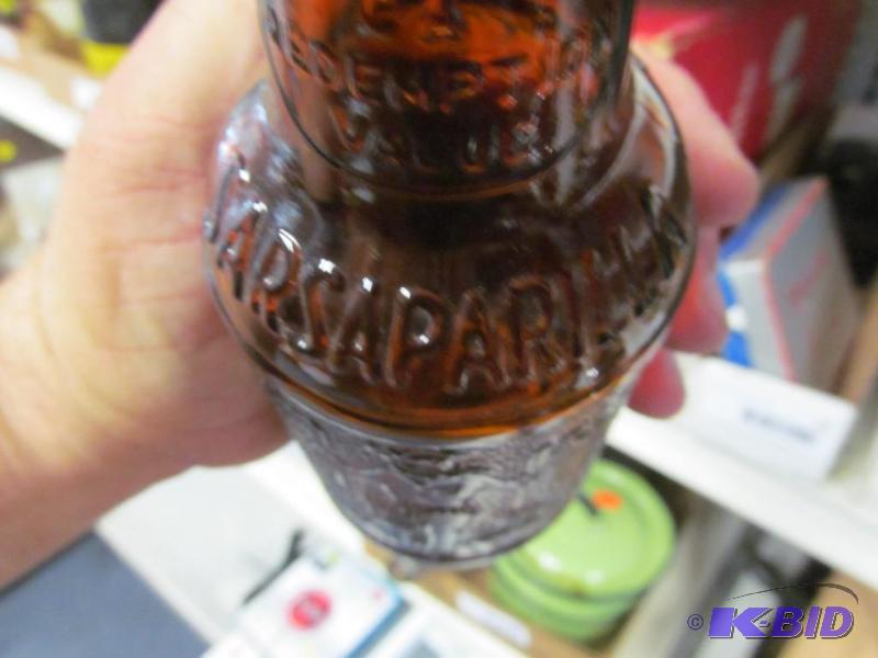 lot 15 image: Lot of 2 Vintage Sioux City Sarsaparilla bottles with caps and one vintage brown bottle maker unknown