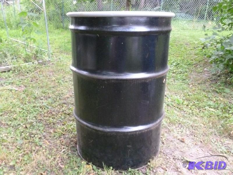 lot 16 image: Large 55 gallon steel drum with lid, was fill...