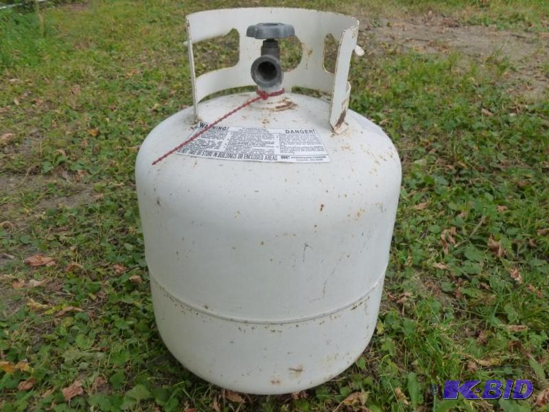 lot 9 image: Twenty Pound propane cylinder tank....
