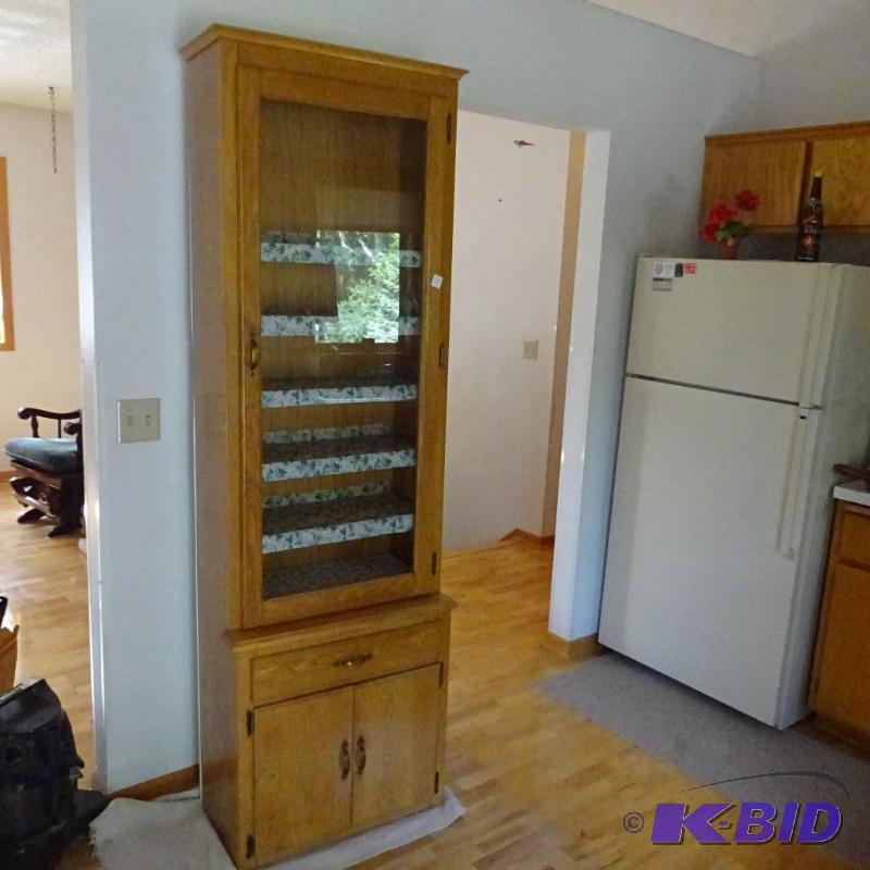 wood gun cabinet converted to a curio cabinet...