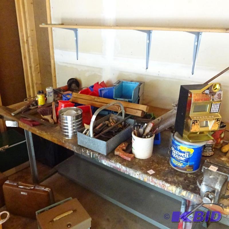 contents of top of table. Tools. Harware bins...