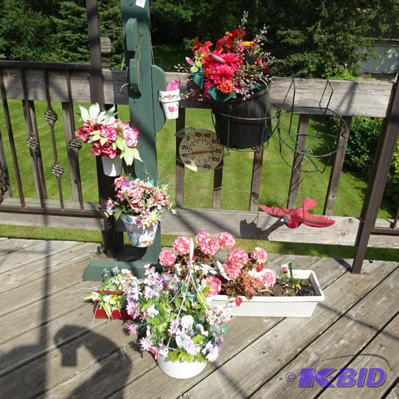 misc. flower arrangements and pots and pot ho...