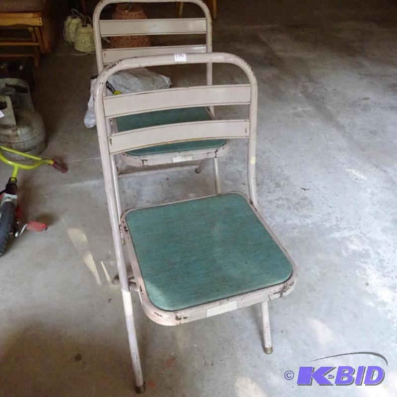 2 metal framed folding chairs...
