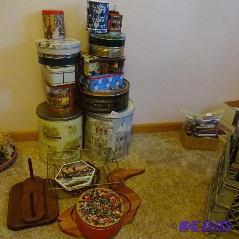 large lot of metal cans and tins. Wood duck. ...