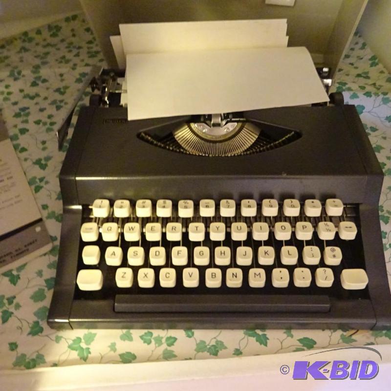 sears manual portable type writer...