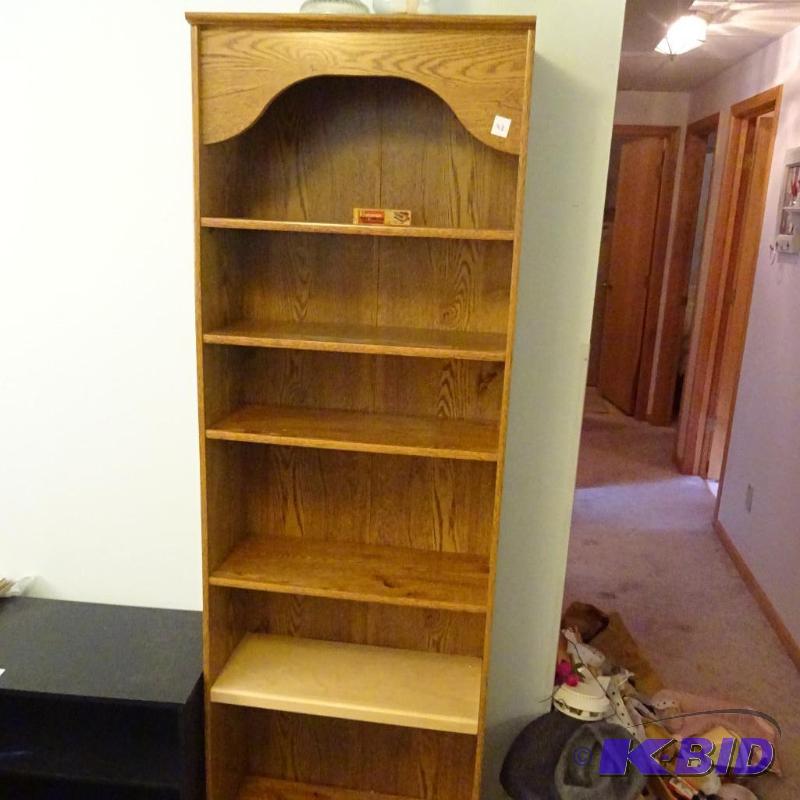 laminate book shelf. 24x10x73...