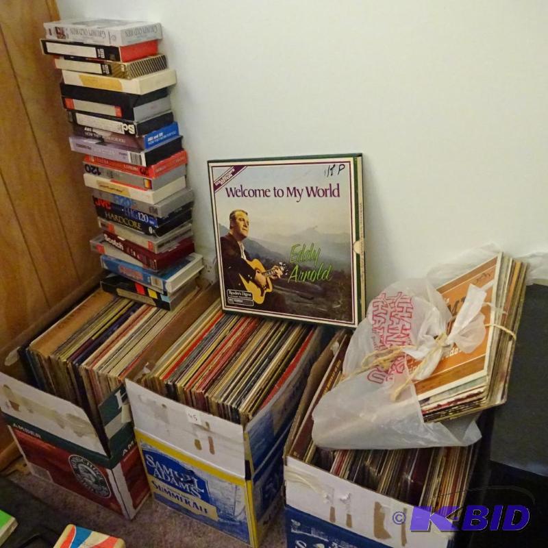 3 boxes of vintage records. Misc VHS tapes...