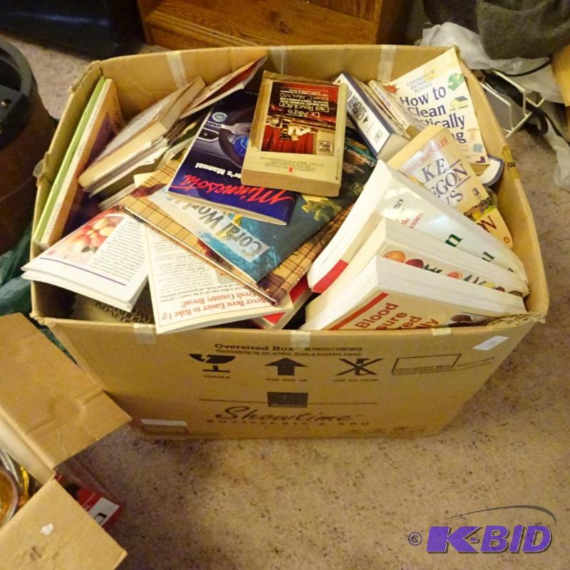 large box of books. Baking. How to. And novel...