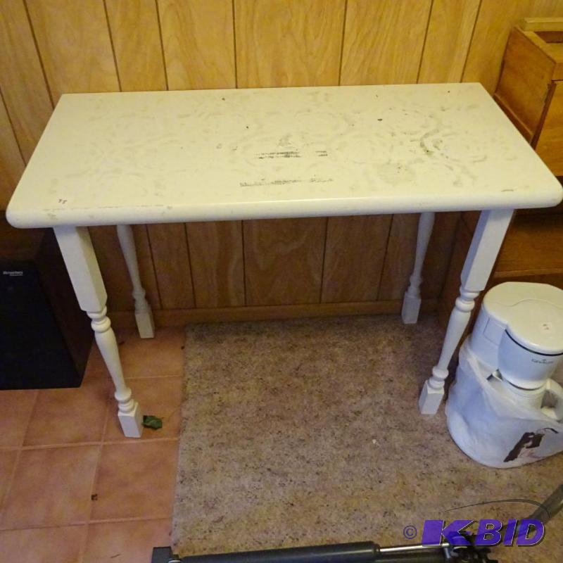 wood table. 37x17x29. top needs refinishing...