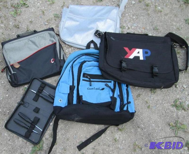 mixed lot of backpacks and bags with a screw ...