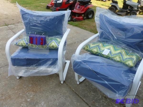 Set of blue stone river cushions and chairs. ...