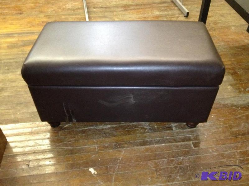 lot 153 image: Brown Vinyl Ottoman  Storage Chest  Has rip ...