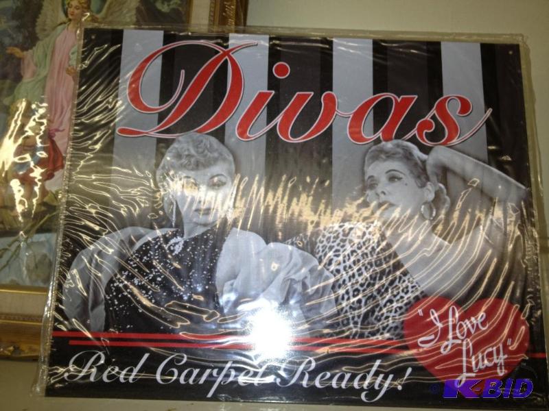 lot 38 image: Lucy Divas tin Sign ...