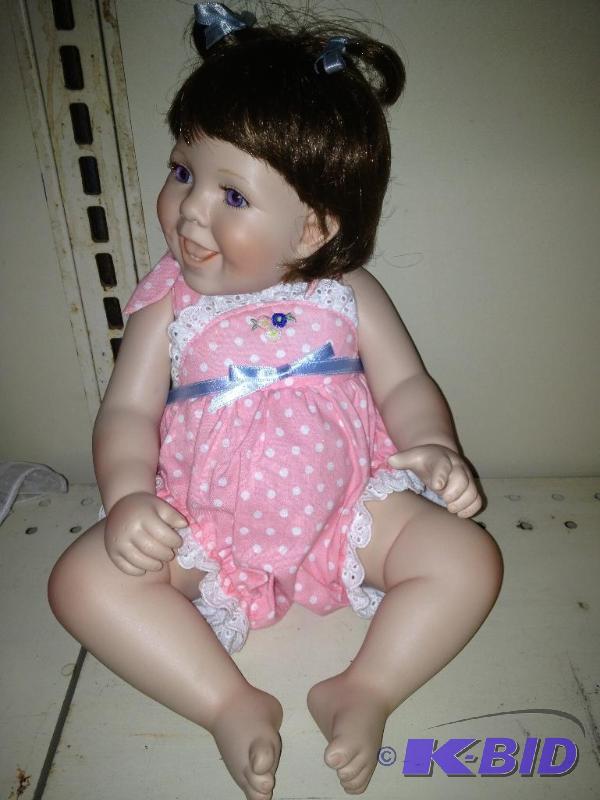 lot 82 image: Porcelain Doll  Excellent condition...