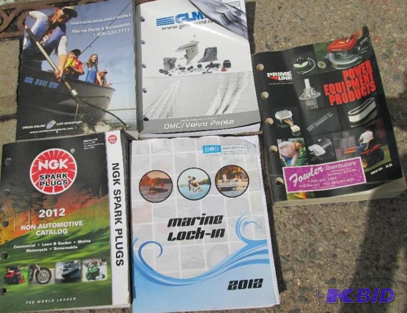 Assorted marine and small engine manuals. Auc...