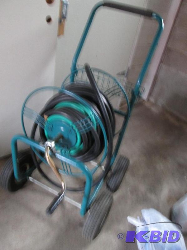 green hosemobile with a hose and small basket...