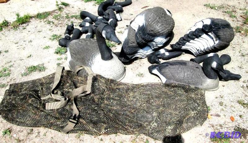 Goose decoys with a mesh cammo bag. 9 small m...
