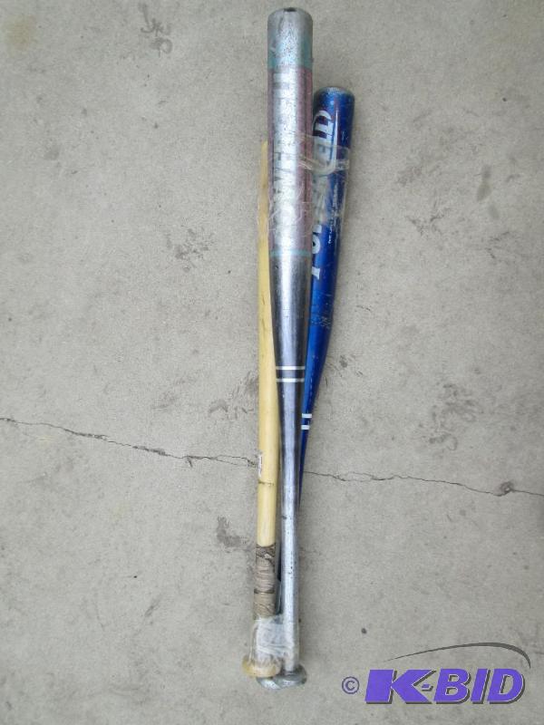 2 metal, 1 wood bat...