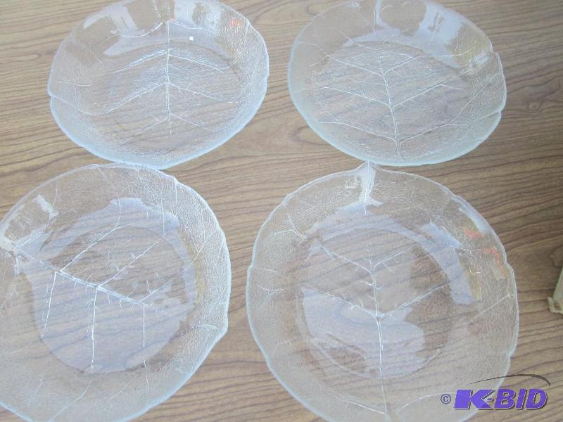 lot 130 image: Set of 4 leaf imprinted plates...