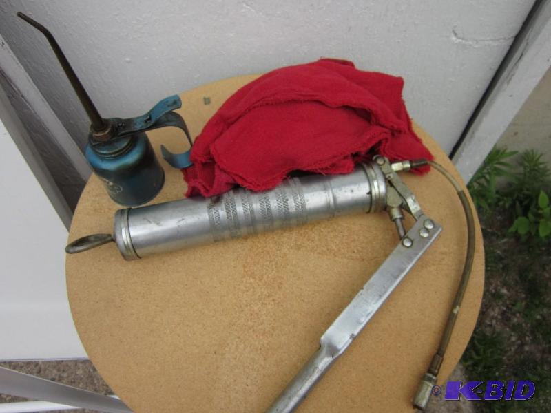 lot 2 image: Oil rags and a grease gun...