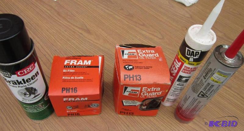 lot 29 image: Oil filters, caulk and cleaner...