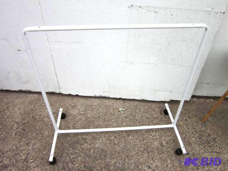lot 32 image: Clothes drying rack on caster wheels...