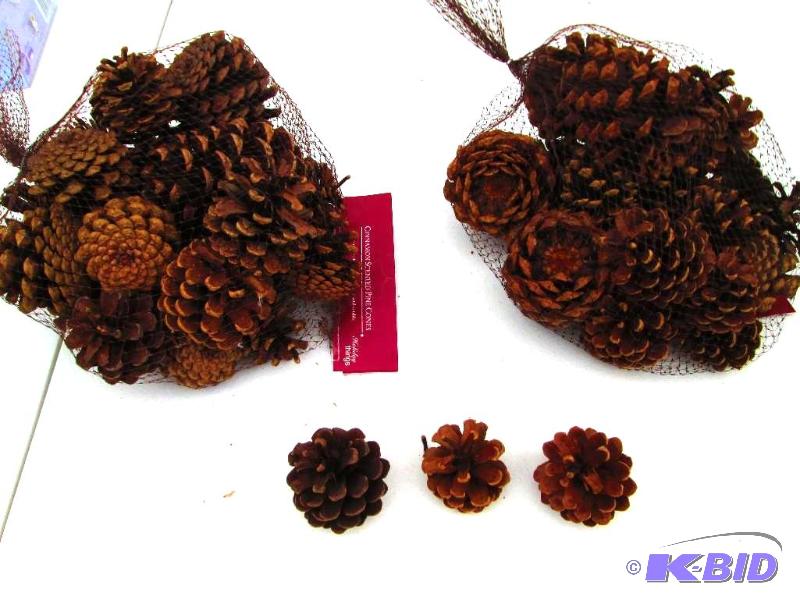 lot 50 image: Cinnamon scented pine cones, new in package...
