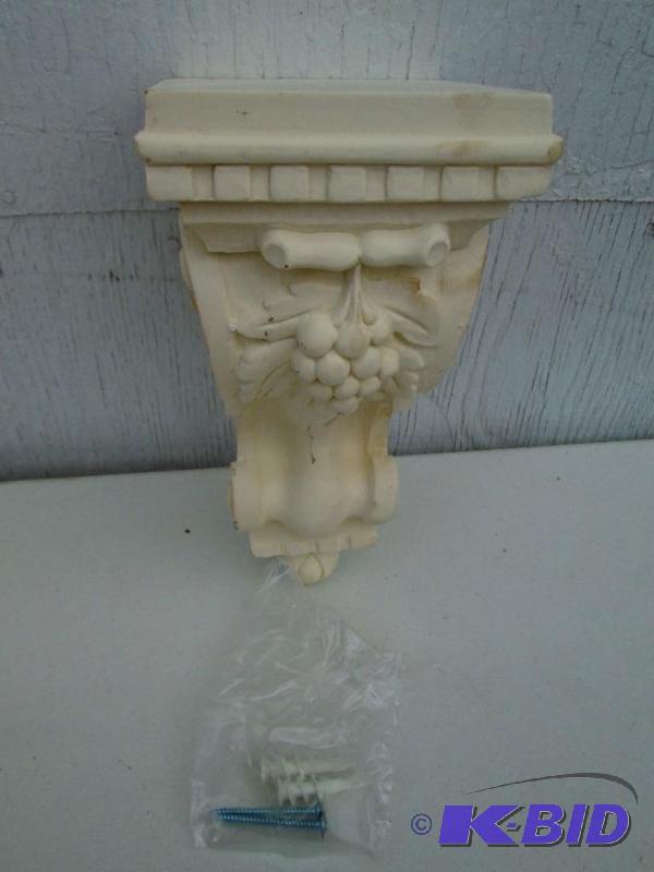lot 54 image: Plaster candle or other wall holder...