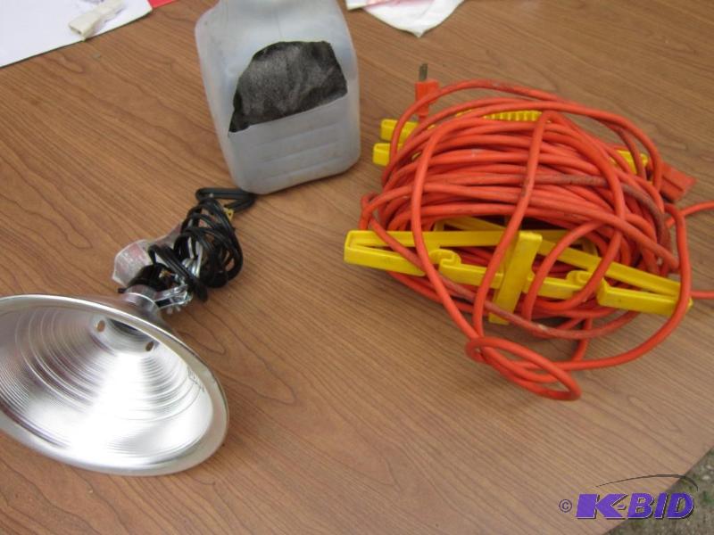 lot 6 image: 50 foot extension cord with coil, shop light ...