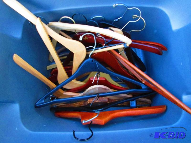 lot 73 image: Bin of suit and wood hangers...
