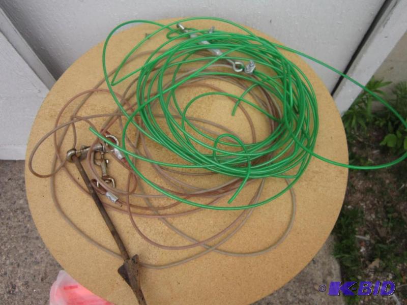 lot 8 image: Dog tie out with extra cable and stake...
