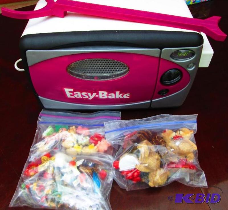 lot 95 image: Easy bake oven with small figures...