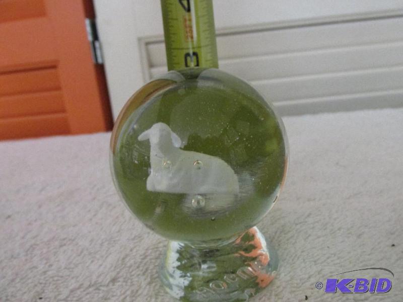lot 21 image: Glass Sphere with Lamb from Nativity Scene.